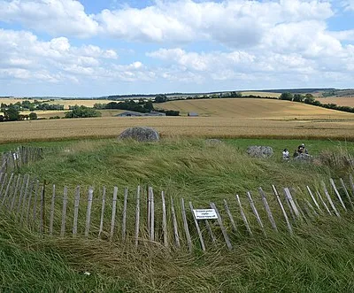 West Kennet long barrow, 800m south-east of Silbury Hill
.mw-parser-output .messagebox{margin:4px 0;width:auto;border-collapse:collapse;border:2px solid var(--border-color-progressive,#6485d1);background-color:var(--background-color-neutral-subtle,#fbfcff);color:var(--color-base,#202122);box-sizing:border-box;border-inline-start-width:8px}.mw-parser-output .messagebox.mbox-small{font-size:88%;line-height:1.25em}.mw-parser-output .mbox-warning,.mw-parser-output .mbox-speedy{border:2px solid var(--border-color-error,#b22222);background:var(--background-color-error-subtle,#ffdbdb);border-inline-start-width:8px}.mw-parser-output .mbox-serious,.mw-parser-output .mbox-delete,.mw-parser-output .mbox-stop{border:2px solid var(--border-color-error,#b22222);border-inline-start-width:8px}.mw-parser-output .mbox-issue,.mw-parser-output .mbox-content{border:2px solid #f28500;background:var(--background-color-warning-subtle,#ffe);border-inline-start-width:8px}.mw-parser-output .mbox-query,.mw-parser-output .mbox-style{border:2px solid #f4c430;background:var(--background-color-warning-subtle,#ffe);border-inline-start-width:8px}.mw-parser-output .mbox-shit{border:2px solid #960;border-inline-start-width:8px}.mw-parser-output .mbox-license{border:2px solid #88a;border-inline-start-width:initial}.mw-parser-output .mbox-legal{border:2px solid var(--border-color-notice,#666);background:var(--background-color-base,#fff);border-inline-start-width:8px}.mw-parser-output .mbox-honor{border:2px solid #ca3;background:var(--background-color-warning-subtle,#fcf4db);border-inline-start-width:8px}.mw-parser-output .mbox-growth{border:2px solid #8d4;background:var(--background-color-success-subtle,#d5fdf4);border-inline-start-width:8px}.mw-parser-output .mbox-move{border:2px solid #93c;border-inline-start-width:8px}.mw-parser-output .mbox-protection,.mw-parser-output .mbox-message{border:2px solid var(--border-color-base,#aaa);border-inline-start-width:8px}.mw-parser-output .messagebox .mbox-text{border:none;padding:0.25em 0.9em;width:100%}.mw-parser-output .messagebox .mbox-image{border:none;padding:2px 0 2px 0.9em;text-align:center}.mw-parser-output .messagebox .mbox-imageright{border:none;padding:2px 0.9em 2px 0;text-align:center}.mw-parser-output .messagebox .mbox-empty-cell{border:none;padding:0;width:1px}.mw-parser-output .messagebox .mbox-invalid-type{text-align:center}@media(min-width:720px){.mw-parser-output .messagebox{margin:4px 10%}.mw-parser-output .messagebox.mbox-small{clear:right;float:right;margin:4px 0 4px 1em;width:238px}}body.skin--responsive .mw-parser-output table.messagebox img{max-width:none!important}Wikidata has entry West Kennet Long Barrow (Q17648040) with data related to this item.