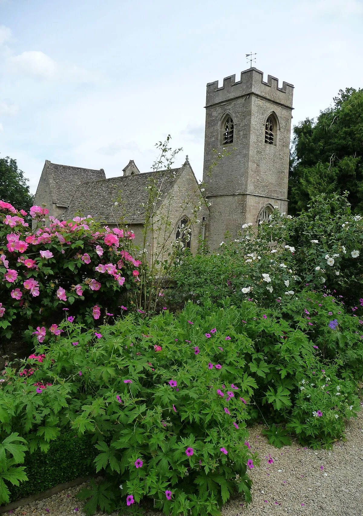 Church of England parish church of Asthal or Asthall, Oxfordshire, seen from the gardens of Asthall Manor.