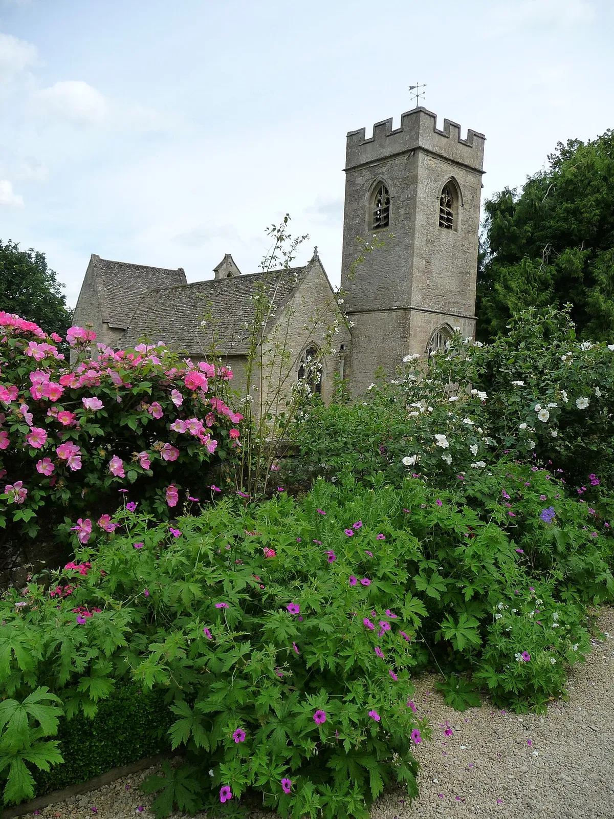 Church of England parish church of Asthal or Asthall, Oxfordshire, seen from the gardens of Asthall Manor.