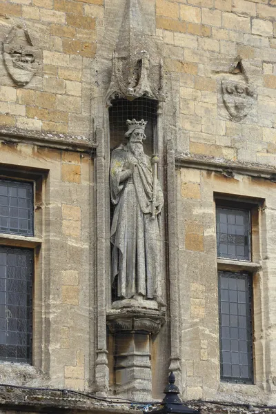 A sculpture of Edward the Confessor on the exterior of the library at Stow-on-the-Wold in Gloucestershire.