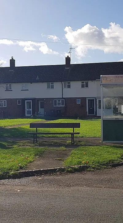 Bus stop and houses, Holly Grove, Ryall, Worcestershire