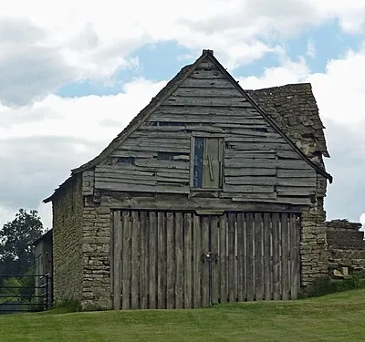 Barn circa 17 metres west of Combe House: Grade II listed building in Sheepscombe, Gloucestershire, UK.
.mw-parser-output .messagebox{margin:4px 0;width:auto;border-collapse:collapse;border:2px solid var(--border-color-progressive,#6485d1);background-color:var(--background-color-neutral-subtle,#fbfcff);color:var(--color-base,#202122);box-sizing:border-box;border-inline-start-width:8px}.mw-parser-output .messagebox.mbox-small{font-size:88%;line-height:1.25em}.mw-parser-output .mbox-warning,.mw-parser-output .mbox-speedy{border:2px solid var(--border-color-error,#b22222);background:var(--background-color-error-subtle,#ffdbdb);border-inline-start-width:8px}.mw-parser-output .mbox-serious,.mw-parser-output .mbox-delete,.mw-parser-output .mbox-stop{border:2px solid var(--border-color-error,#b22222);border-inline-start-width:8px}.mw-parser-output .mbox-issue,.mw-parser-output .mbox-content{border:2px solid #f28500;background:var(--background-color-warning-subtle,#ffe);border-inline-start-width:8px}.mw-parser-output .mbox-query,.mw-parser-output .mbox-style{border:2px solid #f4c430;background:var(--background-color-warning-subtle,#ffe);border-inline-start-width:8px}.mw-parser-output .mbox-shit{border:2px solid #960;border-inline-start-width:8px}.mw-parser-output .mbox-license{border:2px solid #88a;border-inline-start-width:initial}.mw-parser-output .mbox-legal{border:2px solid var(--border-color-notice,#666);background:var(--background-color-base,#fff);border-inline-start-width:8px}.mw-parser-output .mbox-honor{border:2px solid #ca3;background:var(--background-color-warning-subtle,#fcf4db);border-inline-start-width:8px}.mw-parser-output .mbox-growth{border:2px solid #8d4;background:var(--background-color-success-subtle,#d5fdf4);border-inline-start-width:8px}.mw-parser-output .mbox-move{border:2px solid #93c;border-inline-start-width:8px}.mw-parser-output .mbox-protection,.mw-parser-output .mbox-message{border:2px solid var(--border-color-base,#aaa);border-inline-start-width:8px}.mw-parser-output .messagebox .mbox-text{border:none;padding:0.25em 0.9em;width:100%}.mw-parser-output .messagebox .mbox-image{border:none;padding:2px 0 2px 0.9em;text-align:center}.mw-parser-output .messagebox .mbox-imageright{border:none;padding:2px 0.9em 2px 0;text-align:center}.mw-parser-output .messagebox .mbox-empty-cell{border:none;padding:0;width:1px}.mw-parser-output .messagebox .mbox-invalid-type{text-align:center}@media(min-width:720px){.mw-parser-output .messagebox{margin:4px 10%}.mw-parser-output .messagebox.mbox-small{clear:right;float:right;margin:4px 0 4px 1em;width:238px}}body.skin--responsive .mw-parser-output table.messagebox img{max-width:none!important}Wikidata has entry Barn circa 17 metres west of Combe House (Q26383312) with data related to this item.