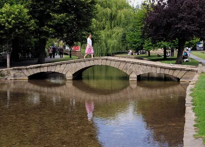 A pedestrian bridge over the River Windrush in Bourton-on-the-Water.