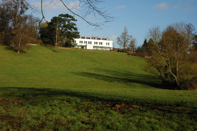 Apperley Court Pevsner describes Apperley Court as: 'An C18 brick farmhouse much expanded in 1817 for Juliana and Charlotte Strickland by John Collingworth.'