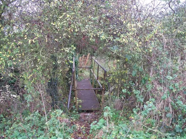 Across the brook This bridge takes the footpath across the brook adjacent to the Draycott sewage works.