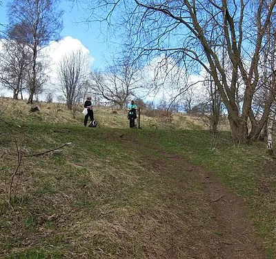 Cotswold Way walkers taking a break on Rudge Hill