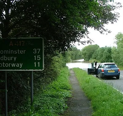 A417 towards Ledbury (showing roadsign) The flooded A417 at 5:50pm