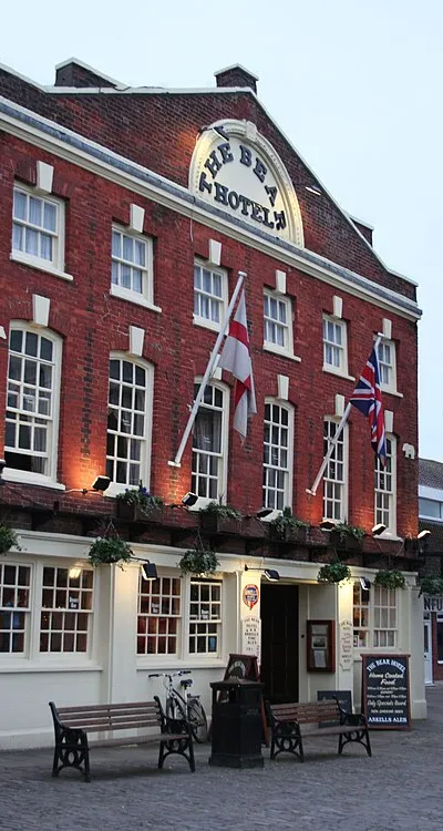 The Bear Hotel: a Grade II listed public house in Wantage, Oxfordshire.
.mw-parser-output .messagebox{margin:4px 0;width:auto;border-collapse:collapse;border:2px solid var(--border-color-progressive,#6485d1);background-color:var(--background-color-neutral-subtle,#fbfcff);color:var(--color-base,#202122);box-sizing:border-box;border-inline-start-width:8px}.mw-parser-output .messagebox.mbox-small{font-size:88%;line-height:1.25em}.mw-parser-output .mbox-warning,.mw-parser-output .mbox-speedy{border:2px solid var(--border-color-error,#b22222);background:var(--background-color-error-subtle,#ffdbdb);border-inline-start-width:8px}.mw-parser-output .mbox-serious,.mw-parser-output .mbox-delete,.mw-parser-output .mbox-stop{border:2px solid var(--border-color-error,#b22222);border-inline-start-width:8px}.mw-parser-output .mbox-issue,.mw-parser-output .mbox-content{border:2px solid #f28500;background:var(--background-color-warning-subtle,#ffe);border-inline-start-width:8px}.mw-parser-output .mbox-query,.mw-parser-output .mbox-style{border:2px solid #f4c430;background:var(--background-color-warning-subtle,#ffe);border-inline-start-width:8px}.mw-parser-output .mbox-shit{border:2px solid #960;border-inline-start-width:8px}.mw-parser-output .mbox-license{border:2px solid #88a;border-inline-start-width:initial}.mw-parser-output .mbox-legal{border:2px solid var(--border-color-notice,#666);background:var(--background-color-base,#fff);border-inline-start-width:8px}.mw-parser-output .mbox-honor{border:2px solid #ca3;background:var(--background-color-warning-subtle,#fcf4db);border-inline-start-width:8px}.mw-parser-output .mbox-growth{border:2px solid #8d4;background:var(--background-color-success-subtle,#d5fdf4);border-inline-start-width:8px}.mw-parser-output .mbox-move{border:2px solid #93c;border-inline-start-width:8px}.mw-parser-output .mbox-protection,.mw-parser-output .mbox-message{border:2px solid var(--border-color-base,#aaa);border-inline-start-width:8px}.mw-parser-output .messagebox .mbox-text{border:none;padding:0.25em 0.9em;width:100%}.mw-parser-output .messagebox .mbox-image{border:none;padding:2px 0 2px 0.9em;text-align:center}.mw-parser-output .messagebox .mbox-imageright{border:none;padding:2px 0.9em 2px 0;text-align:center}.mw-parser-output .messagebox .mbox-empty-cell{border:none;padding:0;width:1px}.mw-parser-output .messagebox .mbox-invalid-type{text-align:center}@media(min-width:720px){.mw-parser-output .messagebox{margin:4px 10%}.mw-parser-output .messagebox.mbox-small{clear:right;float:right;margin:4px 0 4px 1em;width:238px}}body.skin--responsive .mw-parser-output table.messagebox img{max-width:none!important}Wikidata has entry The Bear Hotel (Q26300670) with data related to this item.