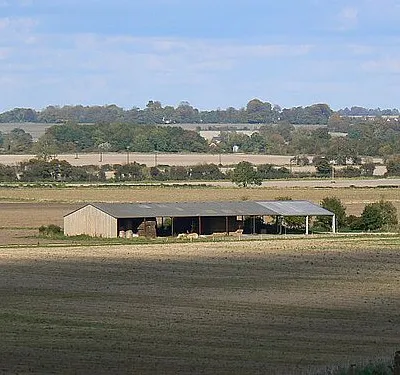 Barn on the byway west of Winterbourne Monkton The barn is not named on the maps, even as a field barn. It has recently been extended on the eastern end as can be seen from the new roof and stanchions.