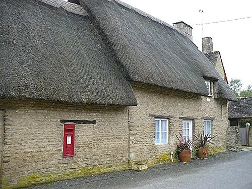Cottage and Post Box, Minster Lovell The George VI post box appears to be where there was once a window onto the street.