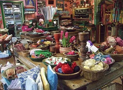 Children shopping at the Organic Farm Shop, Abbey Home Farm, Burford Road, Cirencester