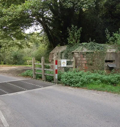 Cattle grid and WW2 pillbox near Denford Mill This WW2 type 22 pillbox, originally part of GHQ Stopline Blue and one of a number of pillboxes in the Dun Mill lock area to the east of Hungerford, was once part of a roadblock but now stands solitary guard over a non-military cattle grid. A plaque just visible by the embrasure reminds visitors to the area of the historical significance of such pillboxes and their role in 1940 had Britain been invaded.