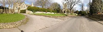 Approach to All Saints Church, Crudwell. I think the building on the left is the Old Rectory Country House. The ancient church straight ahead is All Saints Church. This is the view that you get as you leave the main road coming from The Mayfield House Hotel.