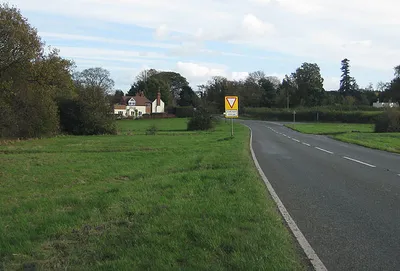 B4211, Rhydd To the right is the turning to Rhydd Green and Hanley Swan via Blackmore End. The main junction beyond is the B4211 meeting the B4424. The River Severn flows beyond the trees.
For information on the Rhydd Ferry, see http://home.freeuk.net/whe/WorcestershirePast/Severn/rhyddfe.htm