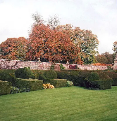 Autumn colour at Avebury Manor Garden - 2 Walled garden with clipped yew alcoves.
http://www.nationaltrust.org.uk/main/w-vh/w-visits/w-findaplace/w-aveburymanorandgarden/