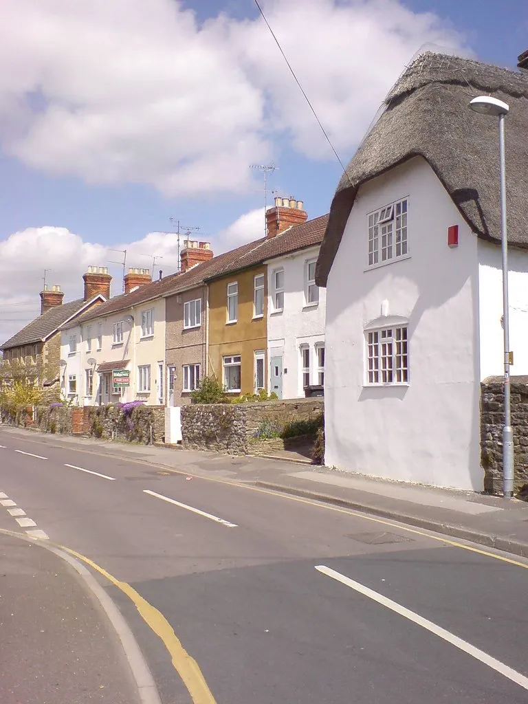 Green Road, Stratton St Margaret, Swindon. The street and thatched cottage date back before the incorporation of Stratton St Margaret into Swindon.