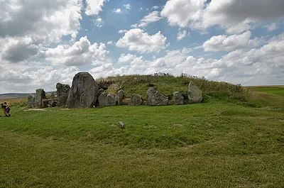 West Kennet long barrow, 800m south-east of Silbury Hill
.mw-parser-output .messagebox{margin:4px 0;width:auto;border-collapse:collapse;border:2px solid var(--border-color-progressive,#6485d1);background-color:var(--background-color-neutral-subtle,#fbfcff);color:var(--color-base,#202122);box-sizing:border-box;border-inline-start-width:8px}.mw-parser-output .messagebox.mbox-small{font-size:88%;line-height:1.25em}.mw-parser-output .mbox-warning,.mw-parser-output .mbox-speedy{border:2px solid var(--border-color-error,#b22222);background:var(--background-color-error-subtle,#ffdbdb);border-inline-start-width:8px}.mw-parser-output .mbox-serious,.mw-parser-output .mbox-delete,.mw-parser-output .mbox-stop{border:2px solid var(--border-color-error,#b22222);border-inline-start-width:8px}.mw-parser-output .mbox-issue,.mw-parser-output .mbox-content{border:2px solid #f28500;background:var(--background-color-warning-subtle,#ffe);border-inline-start-width:8px}.mw-parser-output .mbox-query,.mw-parser-output .mbox-style{border:2px solid #f4c430;background:var(--background-color-warning-subtle,#ffe);border-inline-start-width:8px}.mw-parser-output .mbox-shit{border:2px solid #960;border-inline-start-width:8px}.mw-parser-output .mbox-license{border:2px solid #88a;border-inline-start-width:initial}.mw-parser-output .mbox-legal{border:2px solid var(--border-color-notice,#666);background:var(--background-color-base,#fff);border-inline-start-width:8px}.mw-parser-output .mbox-honor{border:2px solid #ca3;background:var(--background-color-warning-subtle,#fcf4db);border-inline-start-width:8px}.mw-parser-output .mbox-growth{border:2px solid #8d4;background:var(--background-color-success-subtle,#d5fdf4);border-inline-start-width:8px}.mw-parser-output .mbox-move{border:2px solid #93c;border-inline-start-width:8px}.mw-parser-output .mbox-protection,.mw-parser-output .mbox-message{border:2px solid var(--border-color-base,#aaa);border-inline-start-width:8px}.mw-parser-output .messagebox .mbox-text{border:none;padding:0.25em 0.9em;width:100%}.mw-parser-output .messagebox .mbox-image{border:none;padding:2px 0 2px 0.9em;text-align:center}.mw-parser-output .messagebox .mbox-imageright{border:none;padding:2px 0.9em 2px 0;text-align:center}.mw-parser-output .messagebox .mbox-empty-cell{border:none;padding:0;width:1px}.mw-parser-output .messagebox .mbox-invalid-type{text-align:center}@media(min-width:720px){.mw-parser-output .messagebox{margin:4px 10%}.mw-parser-output .messagebox.mbox-small{clear:right;float:right;margin:4px 0 4px 1em;width:238px}}body.skin--responsive .mw-parser-output table.messagebox img{max-width:none!important}Wikidata has entry West Kennet Long Barrow (Q17648040) with data related to this item.
