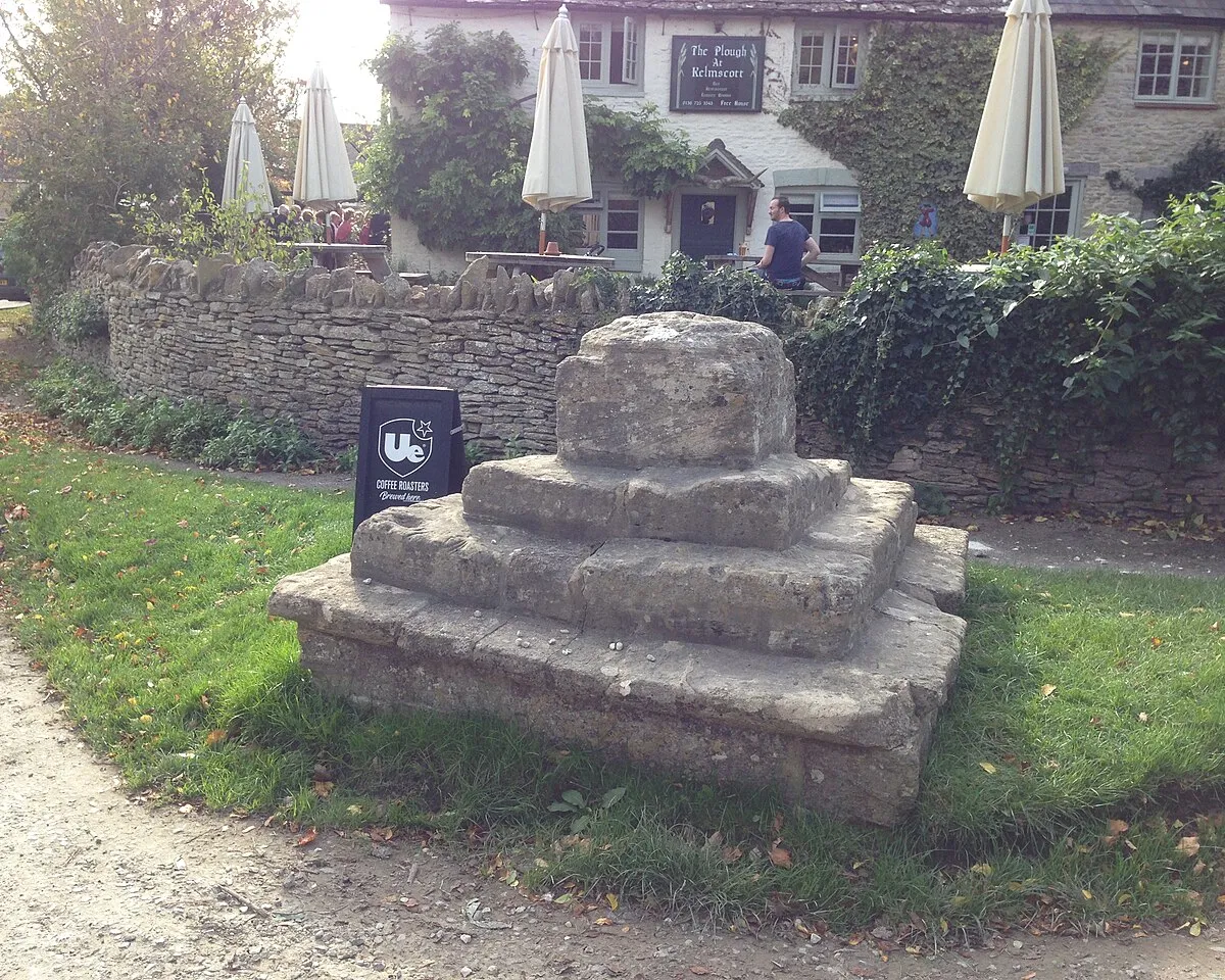 The remains of a 14th or 15th century cross outside The Plough Inn at Kelmscott