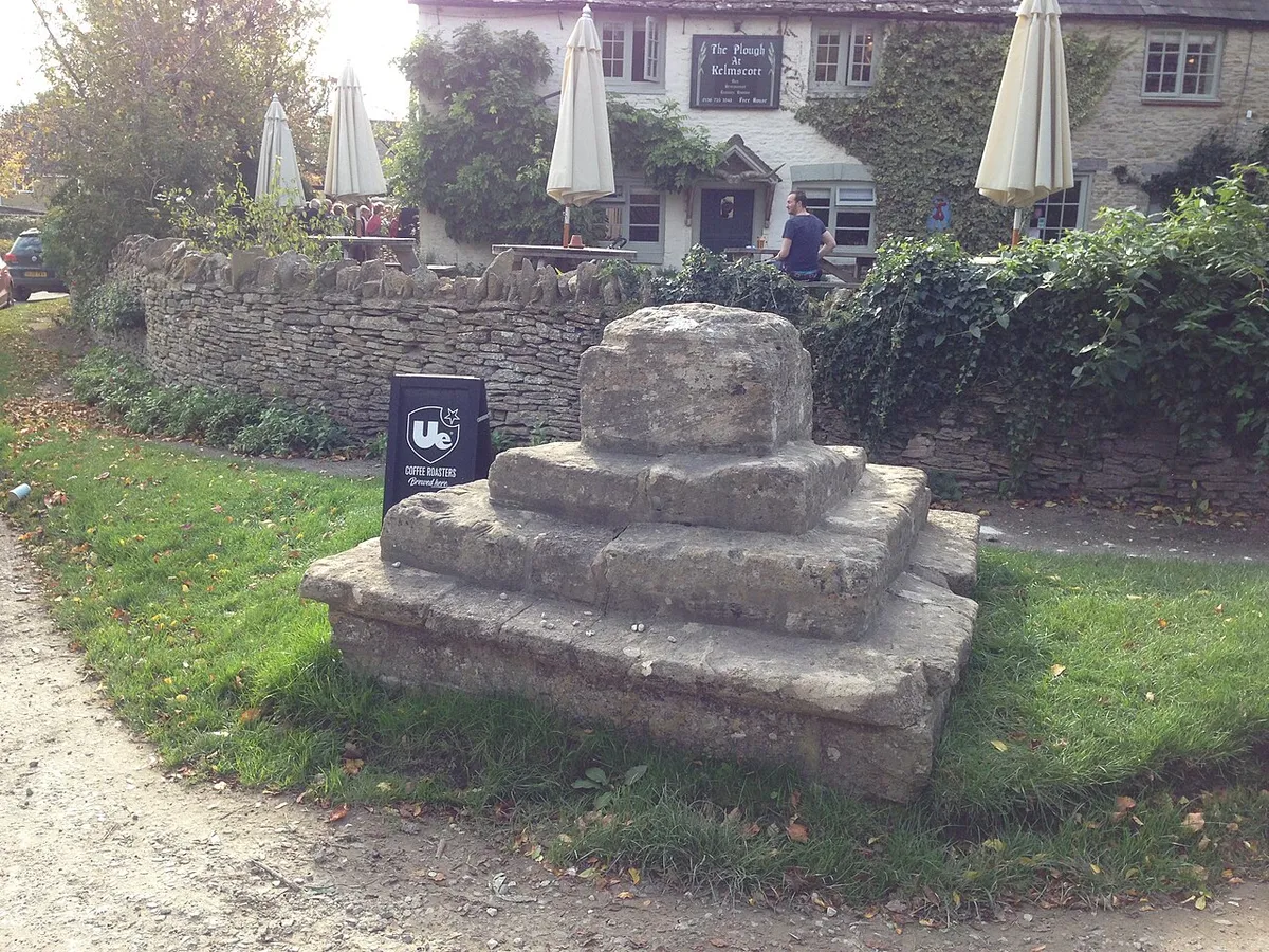 The remains of a 14th or 15th century cross outside The Plough Inn at Kelmscott