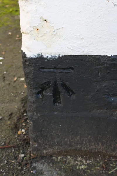 Benchmark on 'The White Hart'