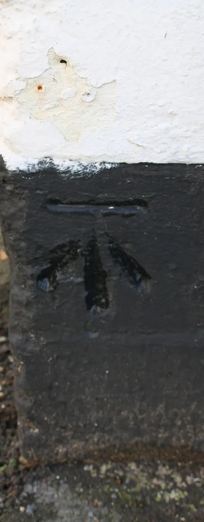Benchmark on 'The White Hart'