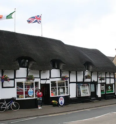 The thatched shop, Prestbury Village Stores, opposite the Kings Arms. A typical village shop selling a variety of items, but unfortunately no string - the days quest. The shop used to be a favourite with Queen Elizabeth, the Queen Mother, who always stopped there on her way to the Cheltenham Races.