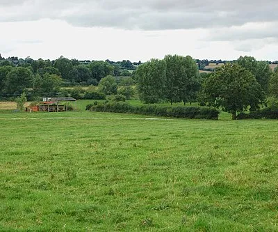 A very special field at Cropredy (2) This otherwise-unremarkable pasture southeast of Cropredy holds a special place in the hearts of the 20,000 people who gather here every year for Fairport's Cropredy Convention music festival which is held every August. The festival occupies ten fields in the area - this meadow is the centre of the event and is used as the concert arena. Also see [1] .