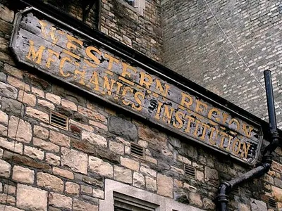 Abandoned Sign on the old Mechanics Institution in Swindon