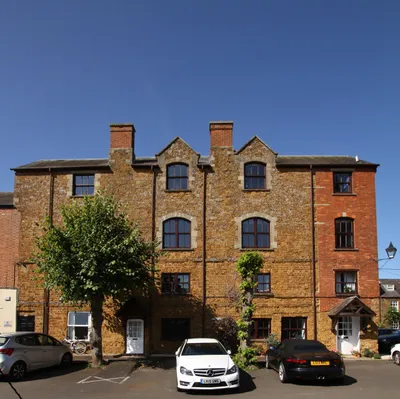 Wychway House, Bull Ring, Deddington, Oxfordshire, seen from the south. Formerly Churchill's Colonial Meat Stores; now an apartment building.
