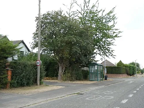 Bus shelter in Tewkesbury Road on edge of Uckington