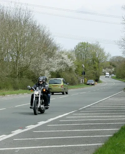 A420 looking east toward Chippenham At the crossroads, Biddestone to the south (right) and Yatton Keynell north (left).
The car parked on the other side of the road is at Red Houses.