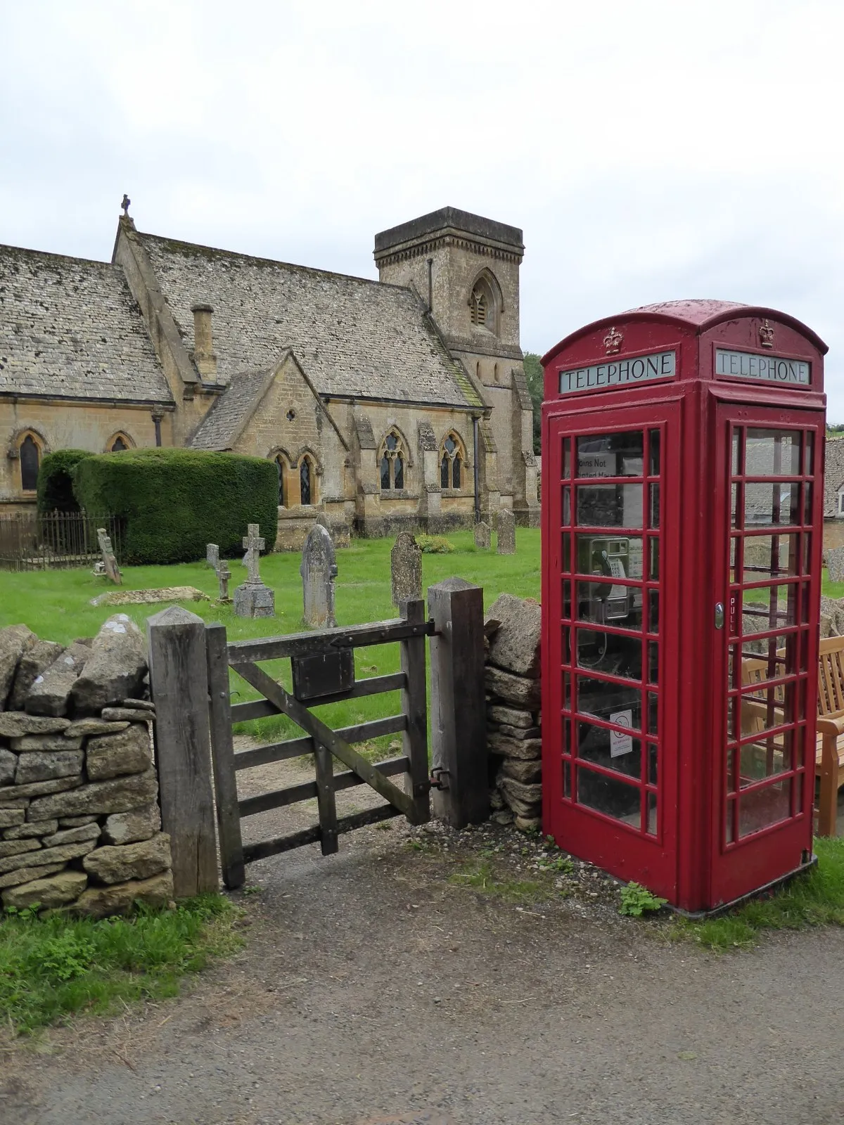 A telephone box with a phone