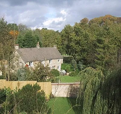 Converted Mill in Tetbury The disused leat running close to the right-hand gable end of this house would suggest that it was originally the local mill.
