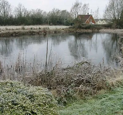 Frozen pond by the Vale of the White Horse Inn