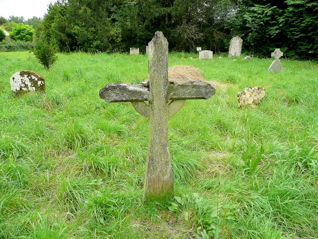A simple wooden cross at St. Peter's To the north of the church at Daylesford.
