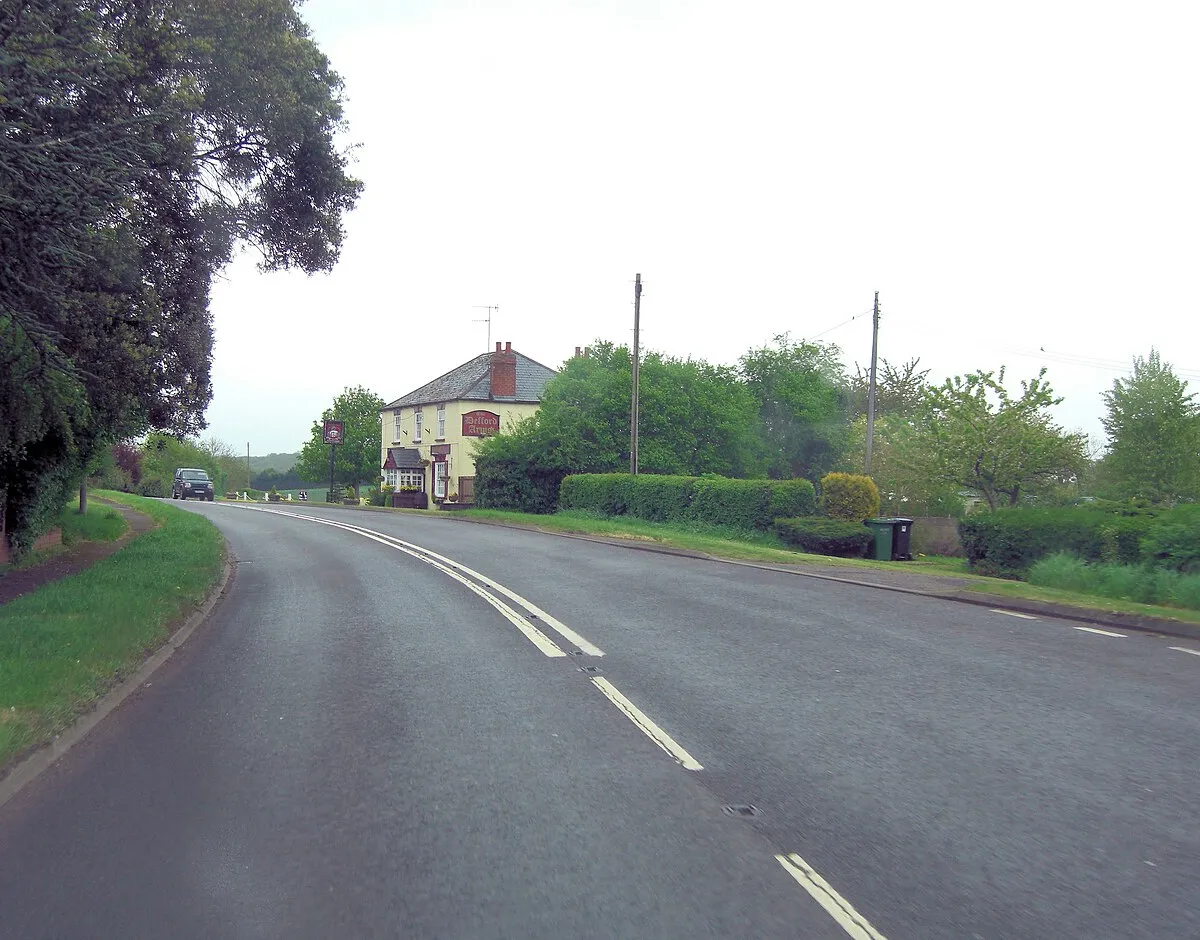 A4104 passes the Defford Arms