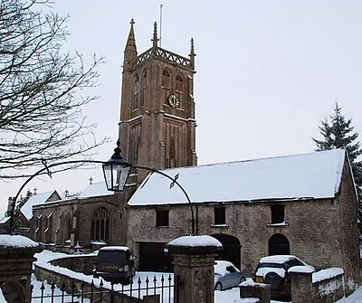Parish church of St John the Baptist, Colerne, Wiltshire, seen from the west in snow