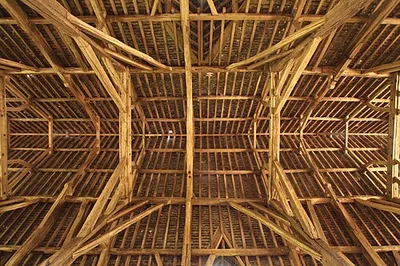 The centre of the roof of the Mediæval barn at Great Coxwell, Oxfordshire (formerly Berkshire), seen from below