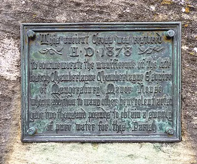A 19th century plaque on the market cross in Stow-on-the-Wold, Gloucestershire.