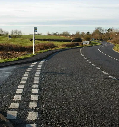 A38 at Prior's Norton View southwards of the A38 from the junction of Church Lane. The right turning right in the middle distance is to Bishop's Norton and Wainlode Hill.
