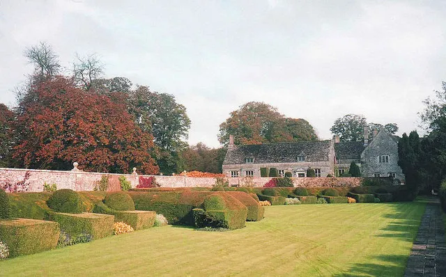 Autumn colour at Avebury Manor Garden in Wiltshire - 1 Beautiful Edwardian garden at this time of year when the majority of visitors have gone. The clipped yew hedges protect the still-flowering borders.