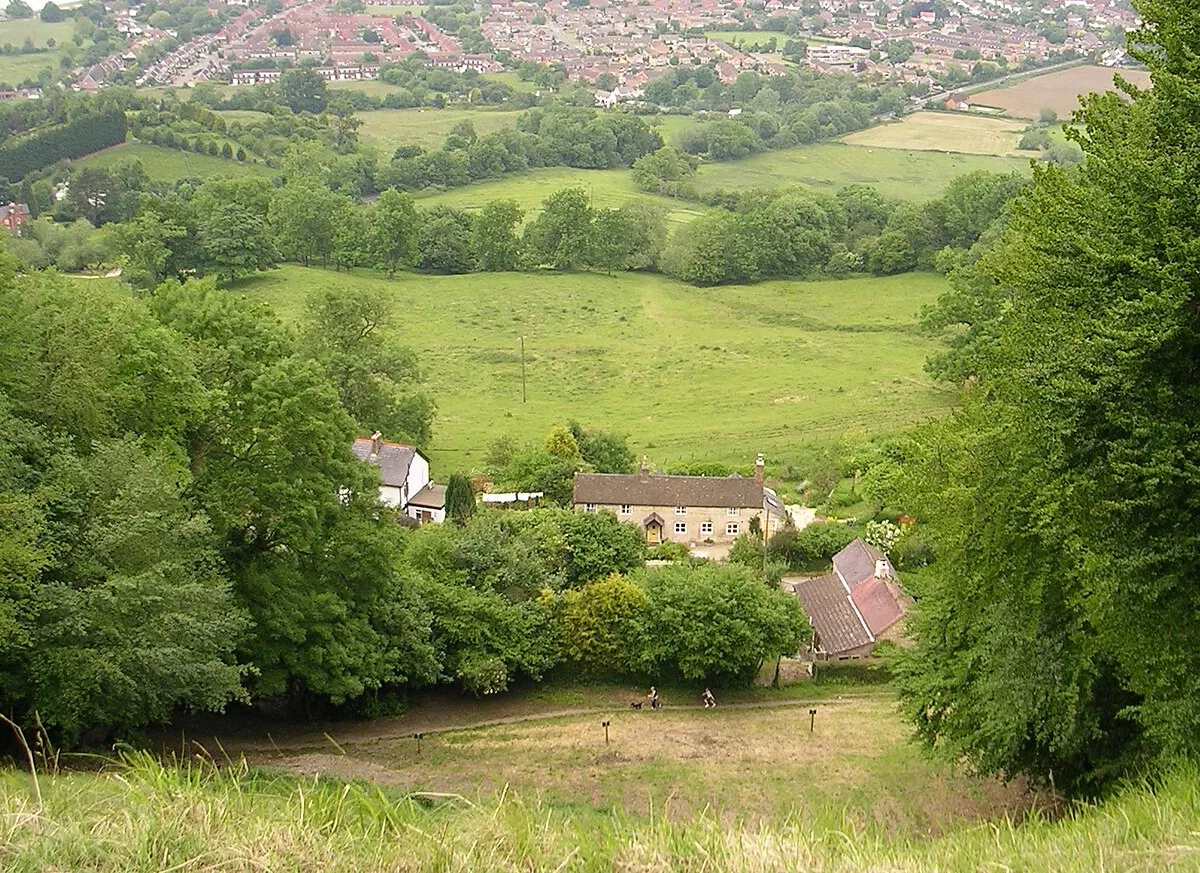 A view from the top of Cooper's Hill in Gloucestershire, where the famous Cheese-Rolling takes place.
This picture is taken from the start point of the race, and the finish is visible below. The actual running surface is concave, and hence cannot be seen from this point.
