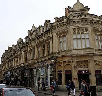 Promenade, Cheltenham Spa. Terrace of 10 shops probably designed by WH Knight and completed in 1890.