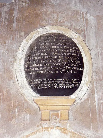 Wall-mounted monument in St Mary's parish church, Lydiard Tregoze, Wiltshire, to Charles Pleydell of Midghall. He was a 17th-century forebear by marriage of the 18th-century Ann Pleydell who is commemorated in the same church. Charles had a total of 19 offspring by two wives, the second of whom died in 1642. Charles himself died in 1679 but his age is not given.
