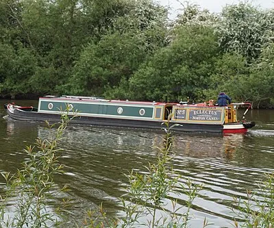 Eclectus sails down the Severn near Apperley