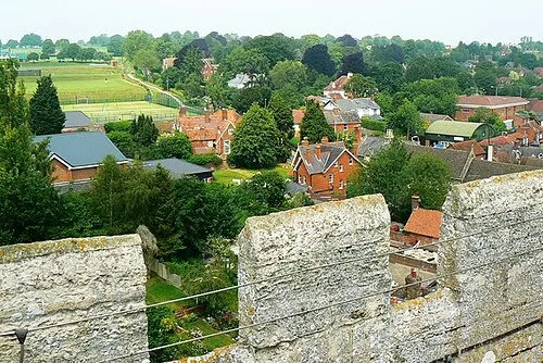 A view to the north-north-west from St Peter's church roof, Marlborough The roof parapet can be seen in the foreground with modern stainless steel cable to minimise the risk of going over the edge.