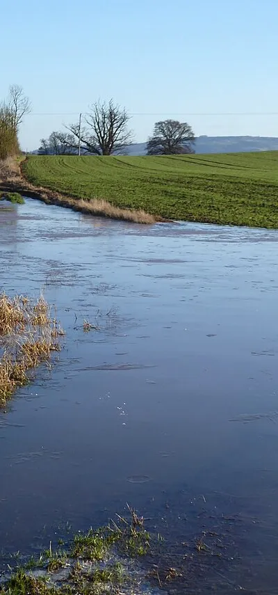 A flooded farmland track
