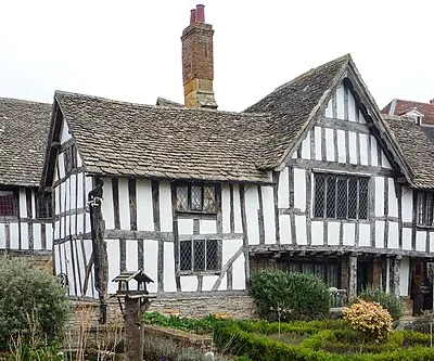 The Almonry, Evesham, Worcestershire, England - viewed from the garden on the south side. A Grade I listed building of 14th century origins. Once the home of the Almoner of the Evesham Benedictine Abbey, the building and gardens now house the Evesham Almonry Museum and Heritage Centre.