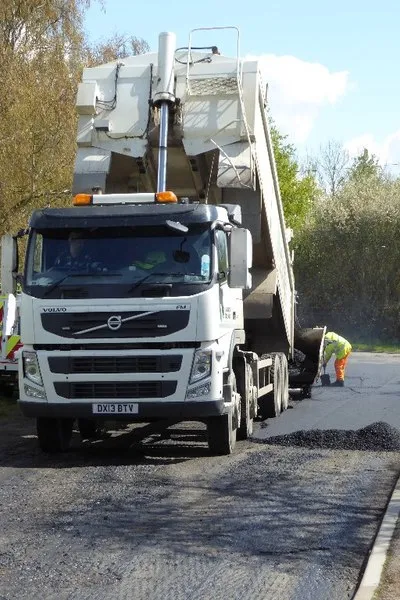 A lorry delivering tarmac