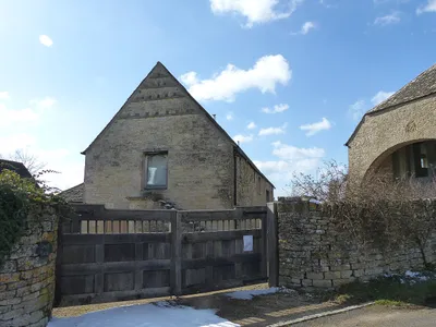 Grade II listed barn in Winstone, Gloucestershire. Listed as "Barn approximately 3m north west of Croft Farmhouse".
.mw-parser-output .messagebox{margin:4px 0;width:auto;border-collapse:collapse;border:2px solid var(--border-color-progressive,#6485d1);background-color:var(--background-color-neutral-subtle,#fbfcff);color:var(--color-base,#202122);box-sizing:border-box;border-inline-start-width:8px}.mw-parser-output .messagebox.mbox-small{font-size:88%;line-height:1.25em}.mw-parser-output .mbox-warning,.mw-parser-output .mbox-speedy{border:2px solid var(--border-color-error,#b22222);background:var(--background-color-error-subtle,#ffdbdb);border-inline-start-width:8px}.mw-parser-output .mbox-serious,.mw-parser-output .mbox-delete,.mw-parser-output .mbox-stop{border:2px solid var(--border-color-error,#b22222);border-inline-start-width:8px}.mw-parser-output .mbox-issue,.mw-parser-output .mbox-content{border:2px solid #f28500;background:var(--background-color-warning-subtle,#ffe);border-inline-start-width:8px}.mw-parser-output .mbox-query,.mw-parser-output .mbox-style{border:2px solid #f4c430;background:var(--background-color-warning-subtle,#ffe);border-inline-start-width:8px}.mw-parser-output .mbox-shit{border:2px solid #960;border-inline-start-width:8px}.mw-parser-output .mbox-license{border:2px solid #88a;border-inline-start-width:initial}.mw-parser-output .mbox-legal{border:2px solid var(--border-color-notice,#666);background:var(--background-color-base,#fff);border-inline-start-width:8px}.mw-parser-output .mbox-honor{border:2px solid #ca3;background:var(--background-color-warning-subtle,#fcf4db);border-inline-start-width:8px}.mw-parser-output .mbox-growth{border:2px solid #8d4;background:var(--background-color-success-subtle,#d5fdf4);border-inline-start-width:8px}.mw-parser-output .mbox-move{border:2px solid #93c;border-inline-start-width:8px}.mw-parser-output .mbox-protection,.mw-parser-output .mbox-message{border:2px solid var(--border-color-base,#aaa);border-inline-start-width:8px}.mw-parser-output .messagebox .mbox-text{border:none;padding:0.25em 0.9em;width:100%}.mw-parser-output .messagebox .mbox-image{border:none;padding:2px 0 2px 0.9em;text-align:center}.mw-parser-output .messagebox .mbox-imageright{border:none;padding:2px 0.9em 2px 0;text-align:center}.mw-parser-output .messagebox .mbox-empty-cell{border:none;padding:0;width:1px}.mw-parser-output .messagebox .mbox-invalid-type{text-align:center}@media(min-width:720px){.mw-parser-output .messagebox{margin:4px 10%}.mw-parser-output .messagebox.mbox-small{clear:right;float:right;margin:4px 0 4px 1em;width:238px}}body.skin--responsive .mw-parser-output table.messagebox img{max-width:none!important}Wikidata has entry Barn approximately 3m north west of Croft Farmhouse (Q26467044) with data related to this item.